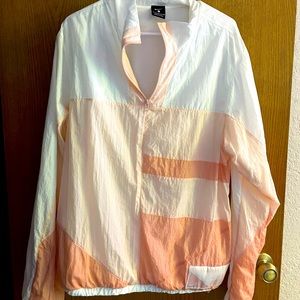 Nike women’s 1/4 zip windbreaker, size Small.